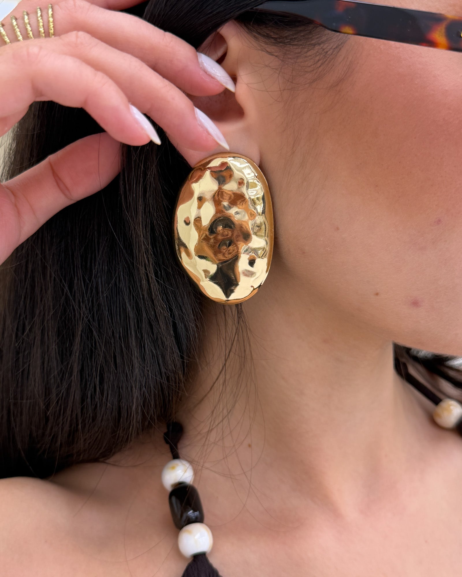 Orecchini oval martellato Oro