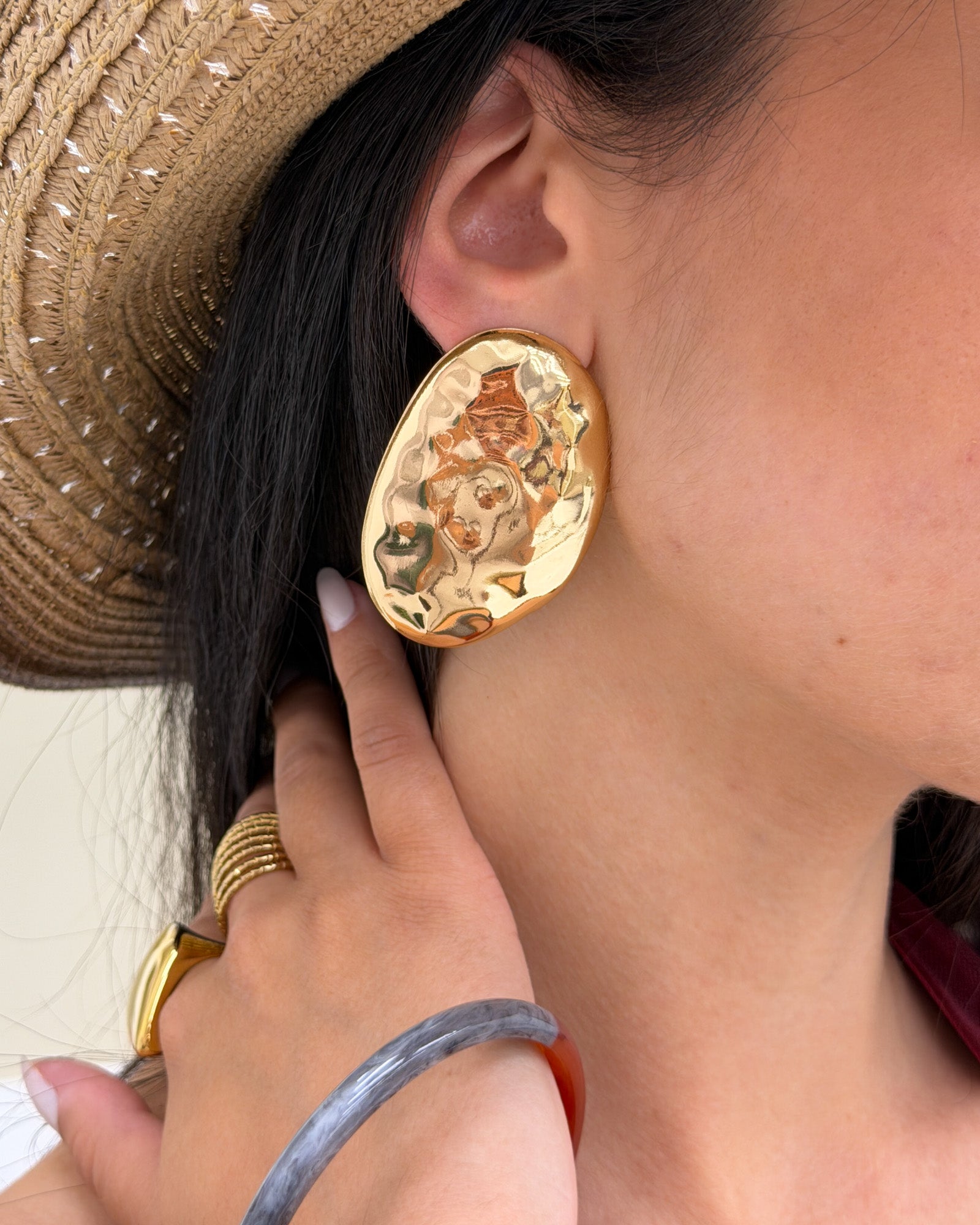 Orecchini oval martellato Oro